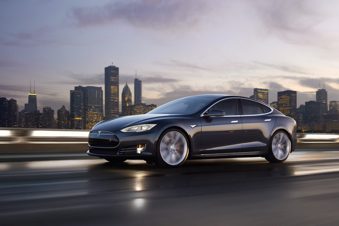 Tesla Model S on highway in motion · The Nerdy Talk